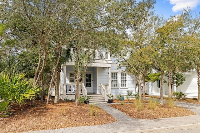 41 Bentley Ln, Santa Rosa Beach, FL 32459 - view of front of property with a balcony and covered porch