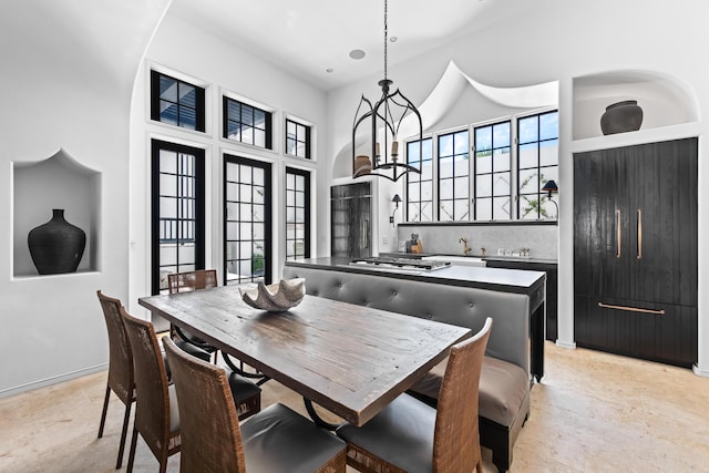 25 Moongate Ct, Inlet Beach, FL 32461 - dining room featuring a high ceiling and baseboards