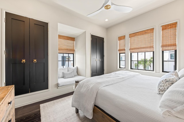 25 Moongate Ct, Inlet Beach, FL 32461 - bedroom with dark wood-style floors, recessed lighting, a ceiling fan, two closets, and baseboards