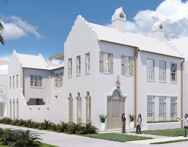 16 Chancery Ln, Inlet Beach, FL 32461 - view of front facade with a chimney, stucco siding, and a tiled roof