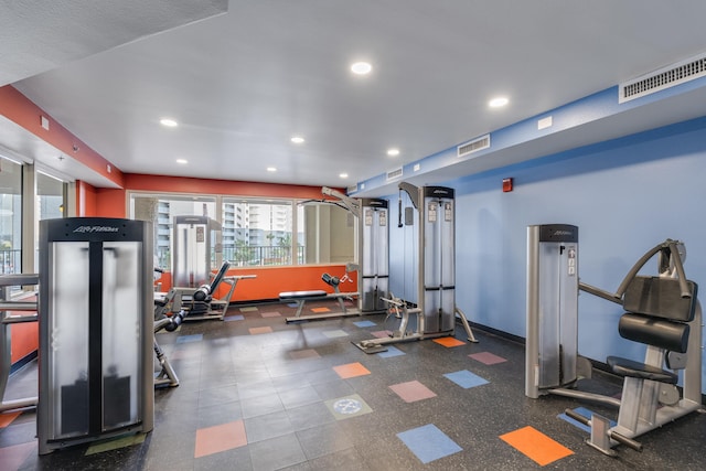 9900 S Thomas Dr Unit 2226, Panama City Beach, FL 32408 - exercise room featuring recessed lighting and baseboards