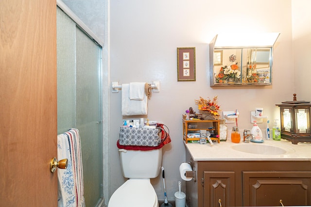 2522 Lake Silver Rd, Crestview, FL 32536 - full bathroom with vanity, a stall shower, and toilet