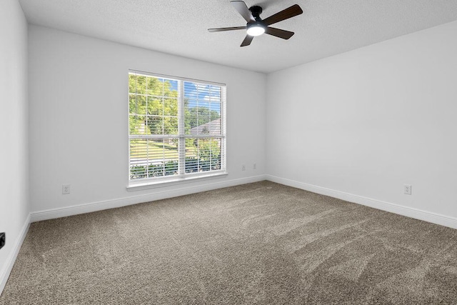 516 Vulpes Sanctuary Loop, Crestview, FL 32536 - unfurnished room with a textured ceiling, carpet floors, ceiling fan, and baseboards