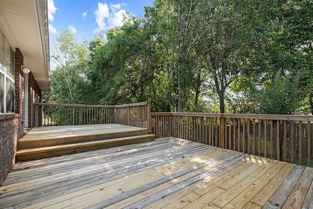 516 Vulpes Sanctuary Loop, Crestview, FL 32536 - wooden deck featuring view of wooded area