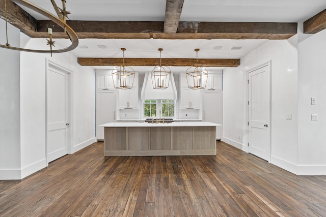 80 Shore Bridge Cir, Inlet Beach, FL 32461 - kitchen featuring dark wood-type flooring, light countertops, white cabinets, baseboards, and beam ceiling