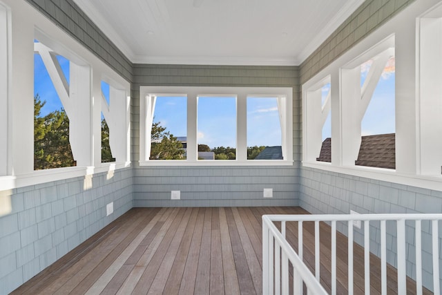80 Shore Bridge Cir, Inlet Beach, FL 32461 - unfurnished sunroom with hardwood / wood-style floors and crown molding