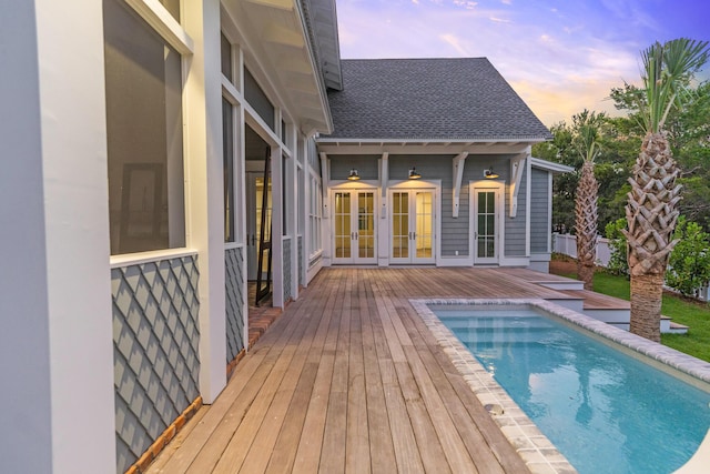 80 Shore Bridge Cir, Inlet Beach, FL 32461 - pool at dusk with french doors and a deck