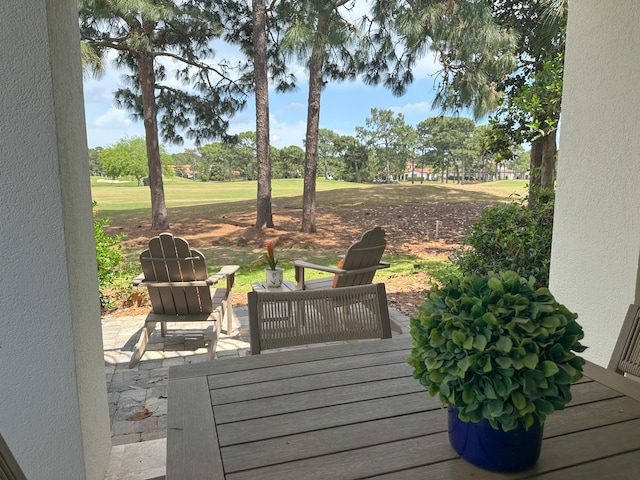 1893 Baytowne Loop, Miramar Beach, FL 32550 - deck with view of golf course and a patio area