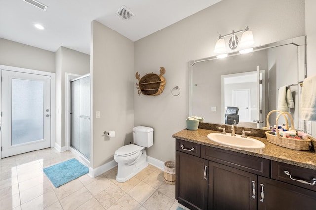 107 Alabama Ave, Lynn Haven, FL 32444 - bathroom with vanity, a stall shower, baseboards, and toilet