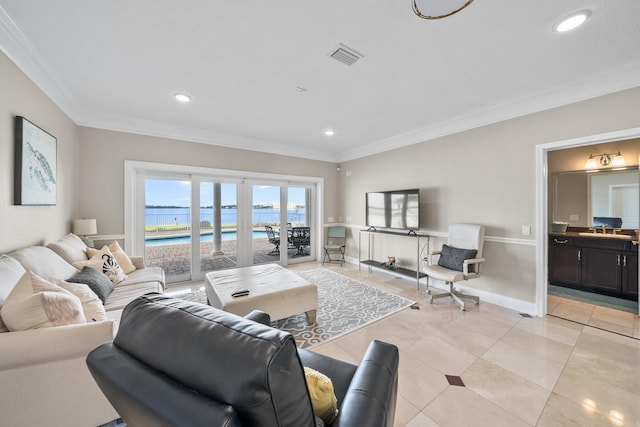 107 Alabama Ave, Lynn Haven, FL 32444 - living area featuring light tile patterned floors, ornamental molding, recessed lighting, and baseboards
