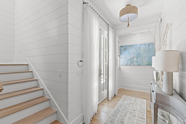 29 Tidal Bridge Way, Watersound, FL 32461 - entryway with light wood-style flooring, stairs, and baseboards