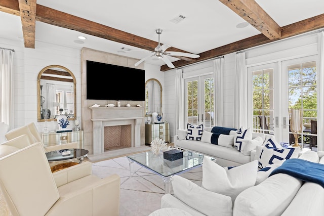 29 Tidal Bridge Way, Watersound, FL 32461 - living area featuring beam ceiling, a premium fireplace, ceiling fan, and french doors