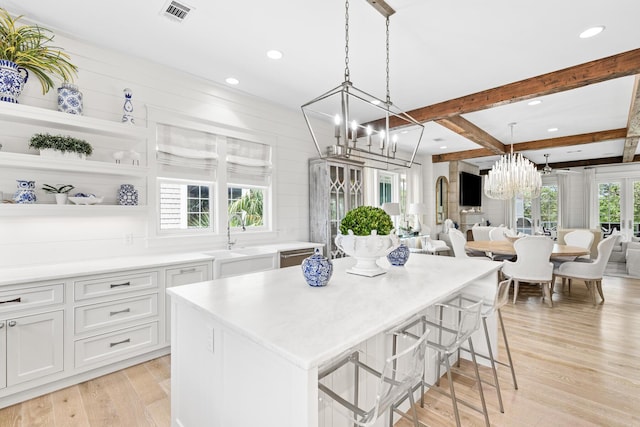 29 Tidal Bridge Way, Watersound, FL 32461 - kitchen featuring a chandelier, a sink, recessed lighting, white cabinets, and light wood-style floors