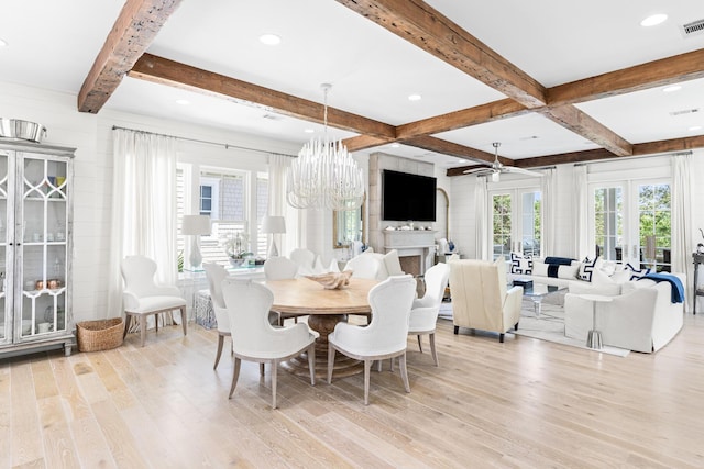 29 Tidal Bridge Way, Watersound, FL 32461 - dining area featuring light wood finished floors, beam ceiling, ceiling fan, coffered ceiling, and a chandelier