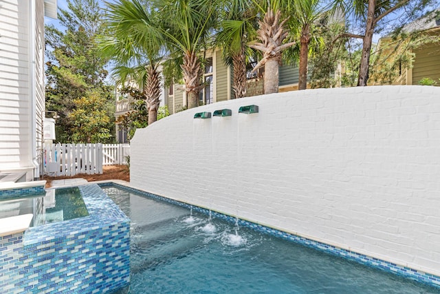 29 Tidal Bridge Way, Watersound, FL 32461 - view of pool with a fenced backyard and a pool with connected hot tub