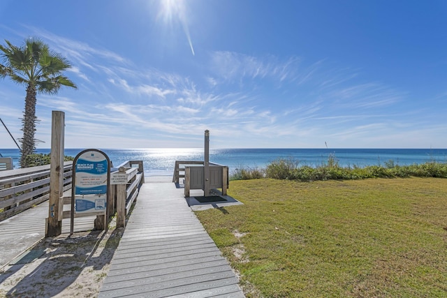 3692 E County Highway 30a Unit 9, Santa Rosa Beach, FL 32459 - surrounding community featuring a lawn and a water view