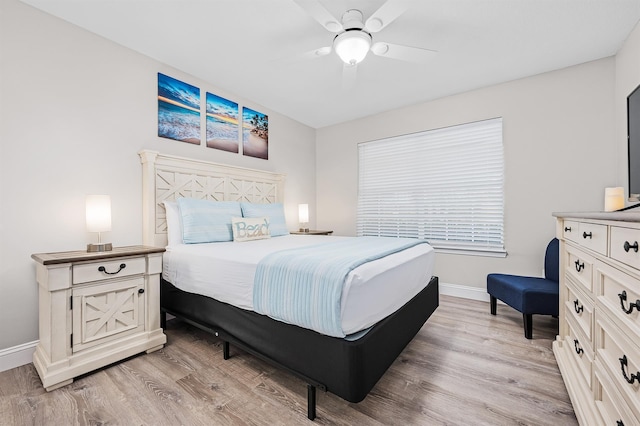 114 Mainsail Dr Unit C28, Miramar Beach, FL 32550 - bedroom featuring baseboards, light wood finished floors, and a ceiling fan