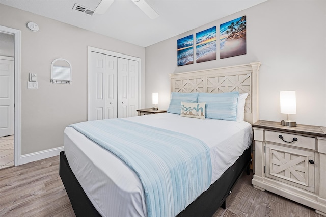 114 Mainsail Dr Unit C28, Miramar Beach, FL 32550 - bedroom featuring light wood-style floors, a closet, baseboards, and a ceiling fan