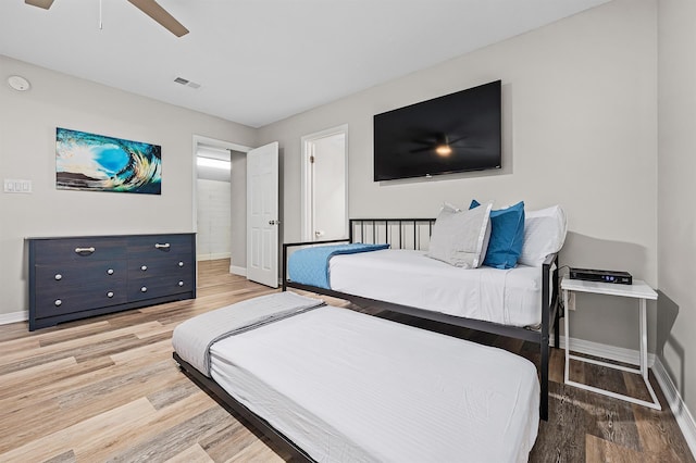 114 Mainsail Dr Unit C28, Miramar Beach, FL 32550 - bedroom featuring baseboards, light wood finished floors, and a ceiling fan
