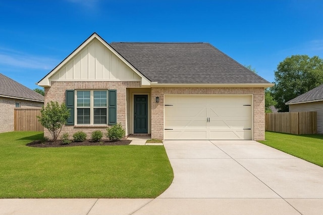 880 Lowery Dr, Fort Walton Beach, FL 32547 - view of front of house featuring board and batten siding, brick siding, concrete driveway, a shingled roof, and an attached garage