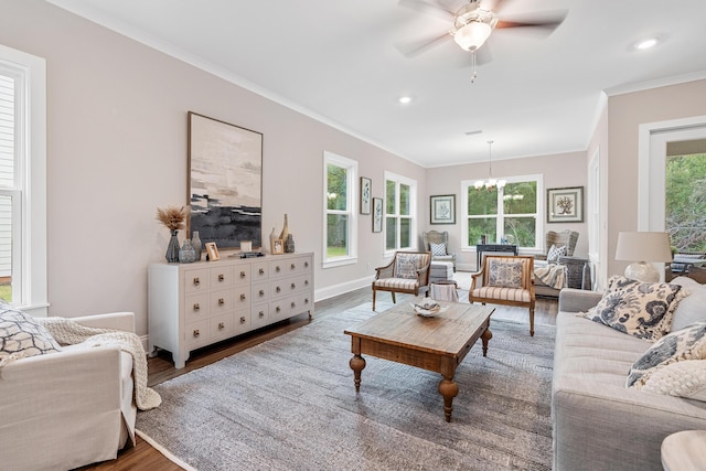 0000 E Bayou Forest Dr Lot 21, Freeport, FL 32439 - living room featuring wood finished floors, ornamental molding, a chandelier, a ceiling fan, and baseboards