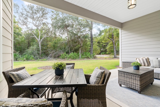 0000 E Bayou Forest Dr Lot 21, Freeport, FL 32439 - view of patio with outdoor dining space, view of wooded area, and an outdoor living space