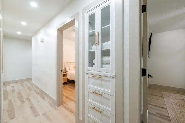538 22nd St, Niceville, FL 32578 - corridor featuring light wood-style flooring, recessed lighting, and baseboards