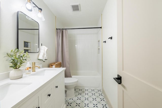538 22nd St, Niceville, FL 32578 - bathroom with double vanity, shower / bathtub combination with curtain, and toilet