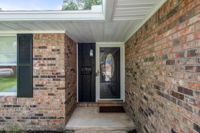 538 22nd St, Niceville, FL 32578 - view of exterior entry with brick siding and covered porch
