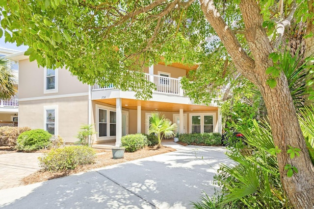 104 Derondo St, Panama City Beach, FL 32413 - multi unit property with a balcony and stucco siding