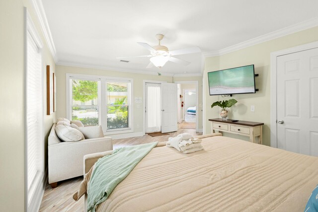 104 Derondo St, Panama City Beach, FL 32413 - bedroom featuring crown molding, light wood-style flooring, ceiling fan, and baseboards