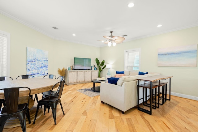 104 Derondo St, Panama City Beach, FL 32413 - living room with light wood-type flooring, crown molding, recessed lighting, a ceiling fan, and baseboards