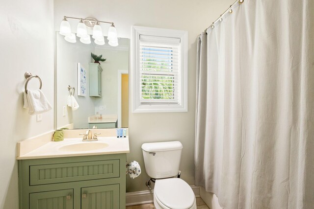 104 Derondo St, Panama City Beach, FL 32413 - full bath with toilet, vanity, and a shower with shower curtain