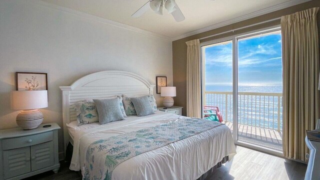 17757 Front Beach Rd Unit 1205C, Panama City Beach, FL 32413 - bedroom with a water view, access to outside, crown molding, wood finished floors, and a ceiling fan