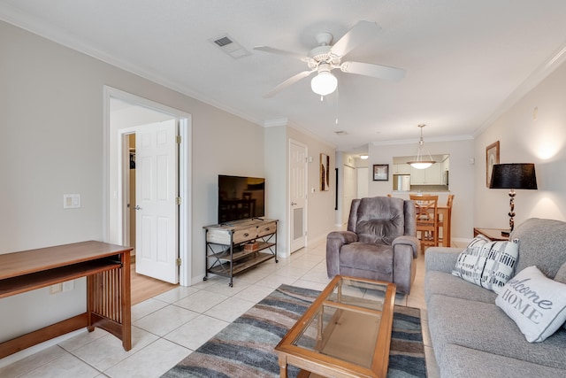4270 Calinda Ln Unit 343, Niceville, FL 32578 - living area featuring crown molding, light tile patterned floors, ceiling fan, and baseboards