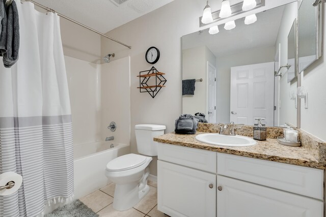 4270 Calinda Ln Unit 343, Niceville, FL 32578 - full bath featuring vanity, shower / bath combo with shower curtain, tile patterned floors, and toilet