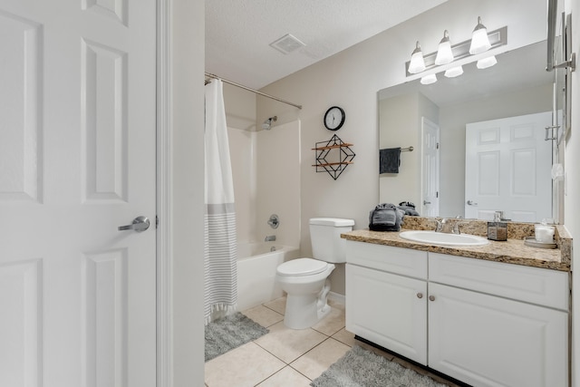 4270 Calinda Ln Unit 343, Niceville, FL 32578 - full bath featuring vanity, toilet, tile patterned floors, and shower / bathtub combination with curtain