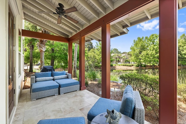 8585 Magnolia Bay Ln, Miramar Beach, FL 32550 - view of patio featuring a water view, a ceiling fan, and outdoor lounge area