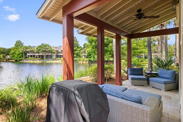 8585 Magnolia Bay Ln, Miramar Beach, FL 32550 - view of patio featuring a water view, grilling area, and a ceiling fan