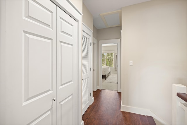8585 Magnolia Bay Ln, Miramar Beach, FL 32550 - hallway with baseboards and dark wood-style flooring