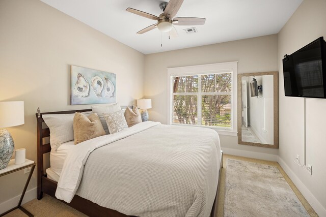 8585 Magnolia Bay Ln, Miramar Beach, FL 32550 - carpeted bedroom featuring baseboards and a ceiling fan