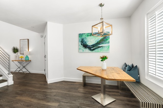130 Durango Rd Unit 104, Destin, FL 32541 - dining area featuring a chandelier, wood finished floors, stairs, and baseboards