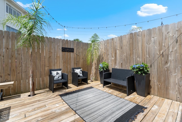 130 Durango Rd Unit 104, Destin, FL 32541 - wooden deck featuring an outdoor living space