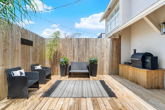 130 Durango Rd Unit 104, Destin, FL 32541 - wooden deck featuring area for grilling