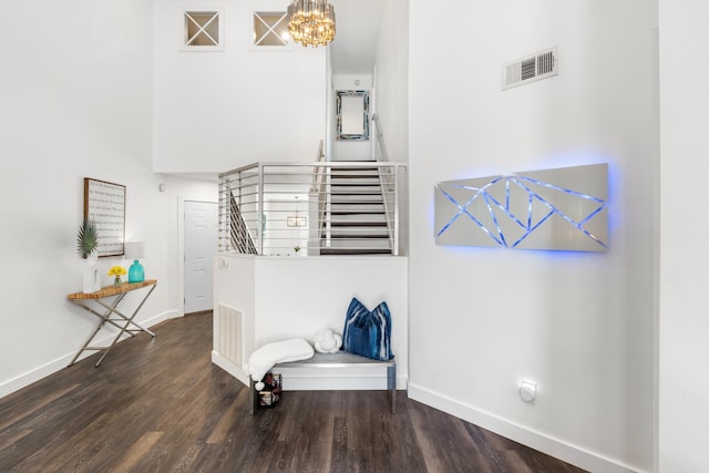 130 Durango Rd Unit 104, Destin, FL 32541 - hall with a chandelier, baseboards, and wood finished floors