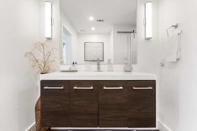 130 Durango Rd Unit 104, Destin, FL 32541 - bathroom featuring vanity and baseboards
