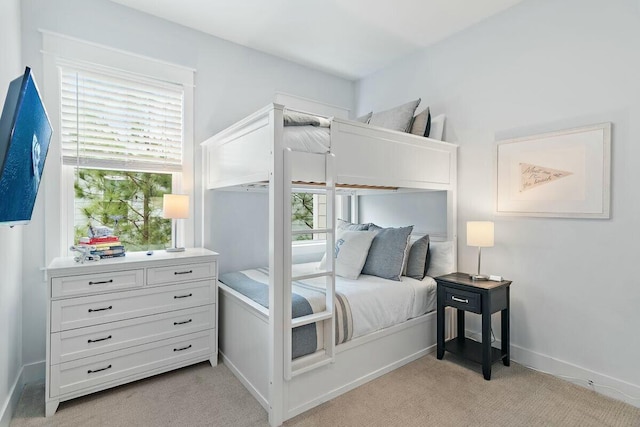 58 E Milestone Dr Unit B, Inlet Beach, FL 32461 - bedroom featuring light colored carpet, multiple windows, and baseboards