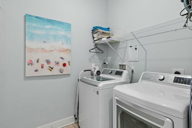 58 E Milestone Dr Unit B, Inlet Beach, FL 32461 - laundry room featuring separate washer and dryer and baseboards