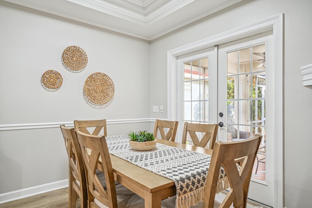 865 Indigo Loop, Destin, FL 32550 - dining room featuring french doors, crown molding, wood finished floors, and baseboards