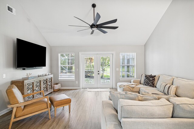 865 Indigo Loop, Destin, FL 32550 - living area featuring lofted ceiling, wood finished floors, a ceiling fan, baseboards, and french doors